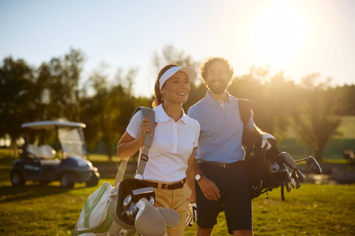 couple golfing in Asheville, NC