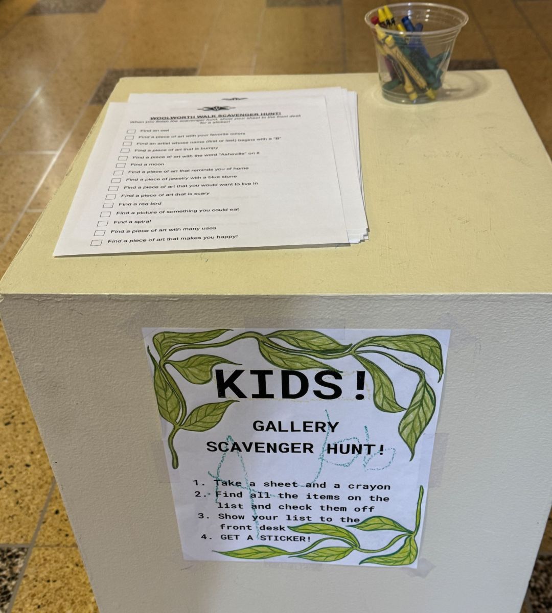 Woolworth Walk scavenger hunt activity for children featuring art gallery checklist and coloring supplies in downtown Asheville NC