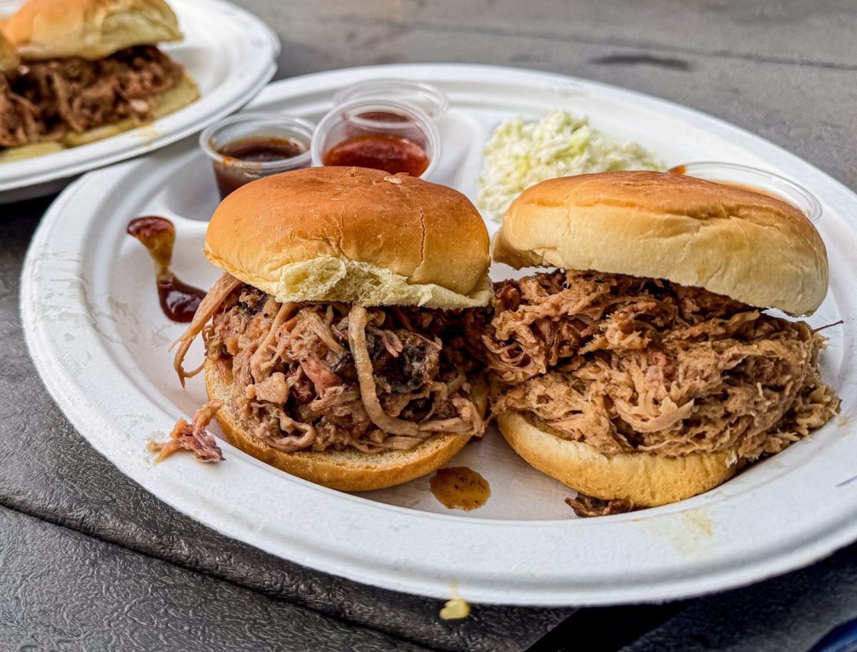 Slow-smoked pulled pork sandwiches from Garage Barbecue in Asheville, NC, served with house-made barbecue sauces and creamy coleslaw. A popular menu item at one of Asheville's favorite barbecue food trucks.