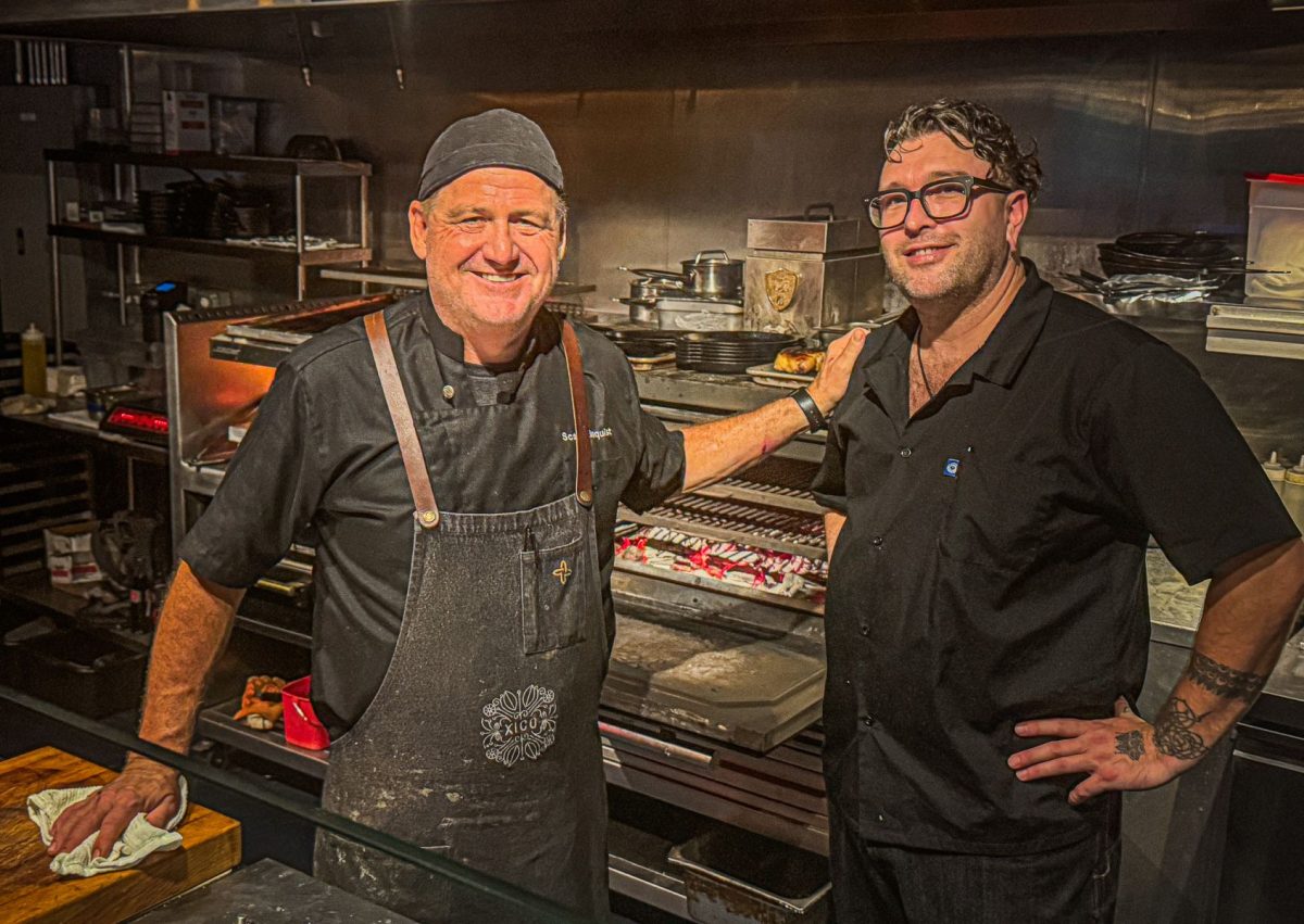 Chefs Scott Linquist and Benjamin in the kitchen at Xico Cocina de Fuego in Asheville.